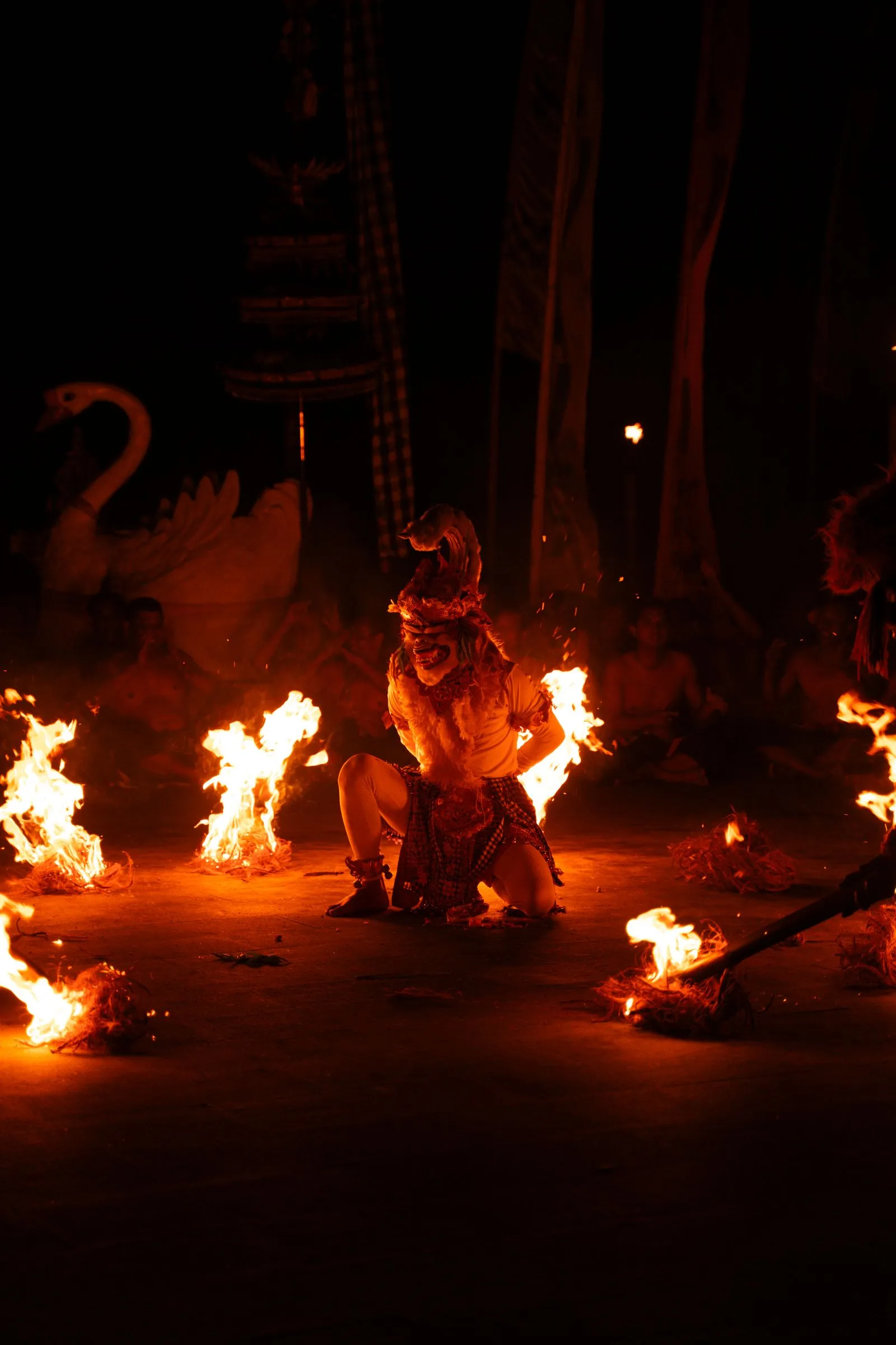 A fire dancer at twilight — the energy of a Bali celebration