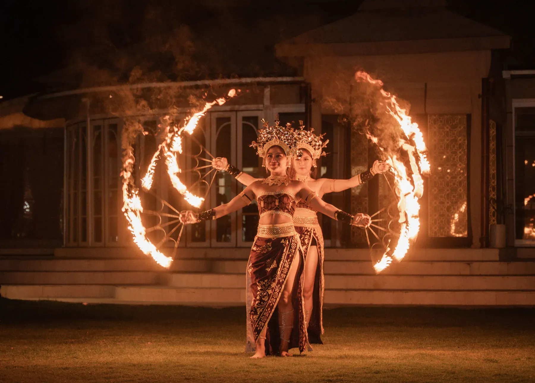 Balinese fire dancers performing at a wedding reception